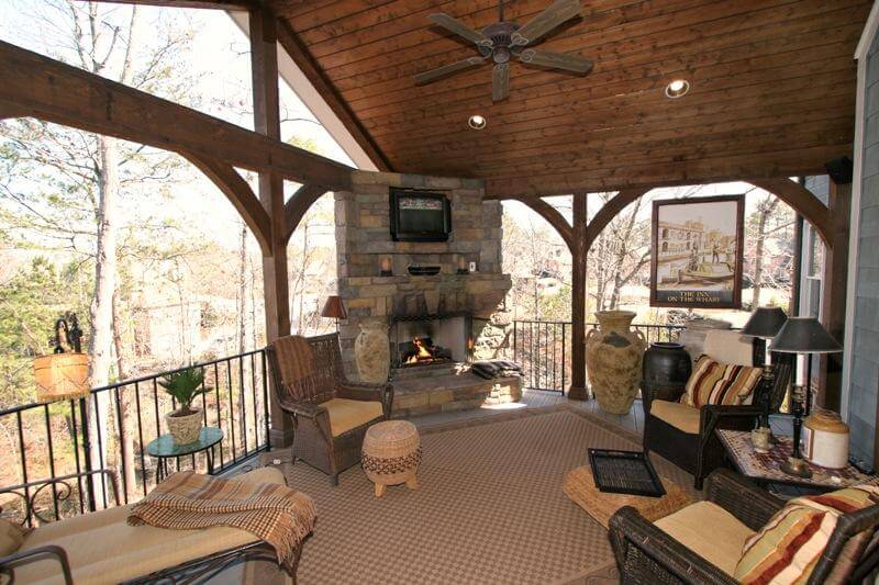 cozy open porch with fireplace